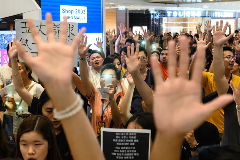 Hong Kong Students’ Subdued Anthem Rendition Sparks Debate on Patriotism and Protest