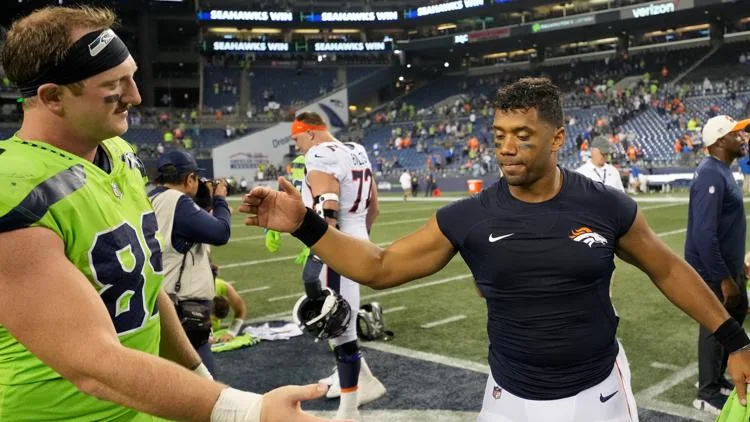 Class Act: Seattle Seahawks Gift Russell Wilson Throwback Jersey in Heartfelt Gesture